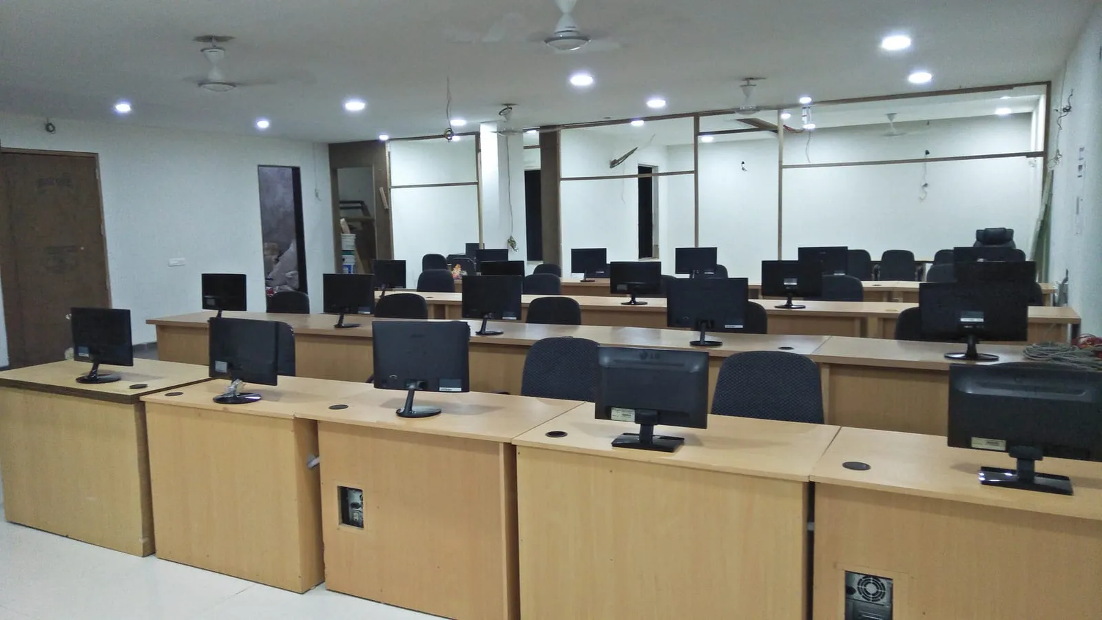 Workstations and desk phones across the SiOnline office